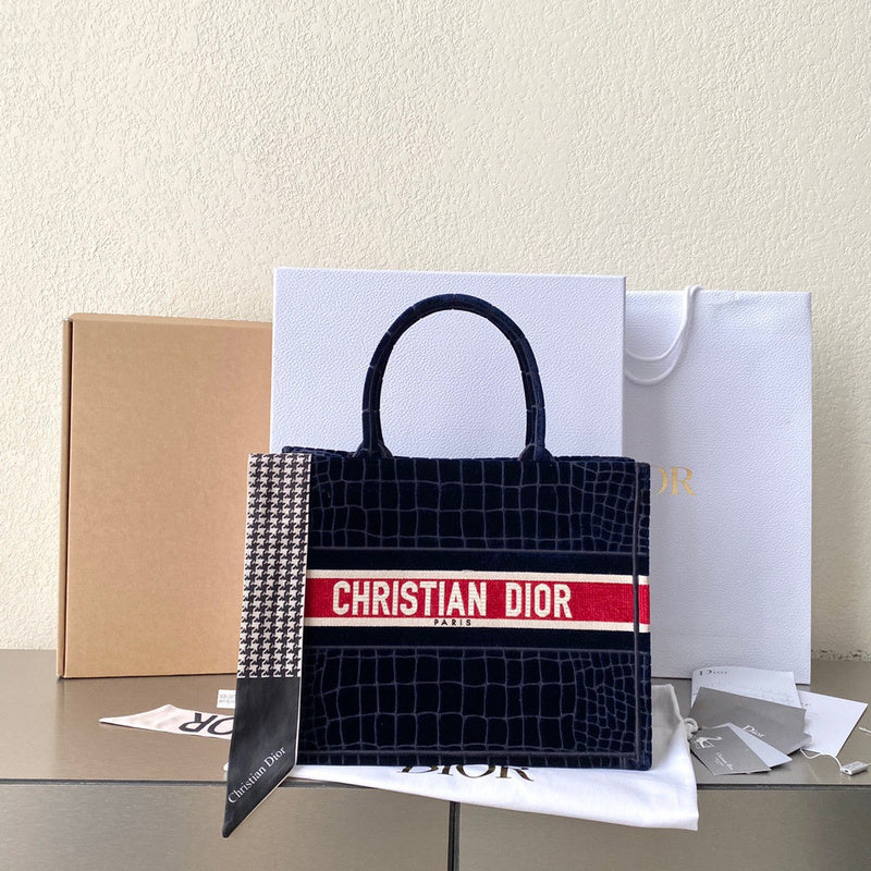 Styled lifestyle shot of structured signature women's handbag – women's designer-style accessory