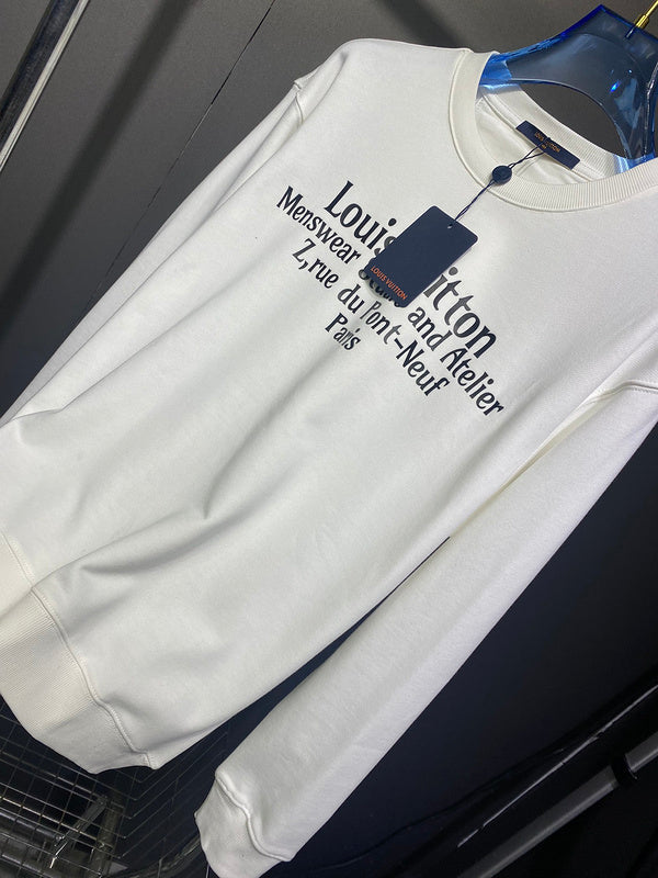 Close-up detail shot of Louis Vuitton luxury clothing with runway-inspired design