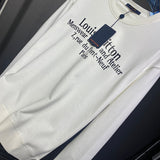 Close-up detail shot of Louis Vuitton luxury clothing with runway-inspired design