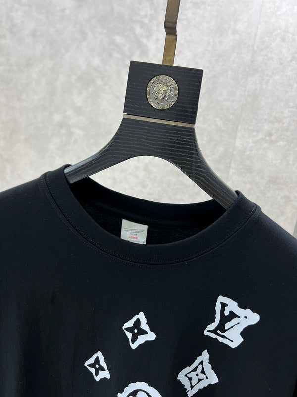 Close-up detail shot of Louis Vuitton luxury clothing with logo-detail design