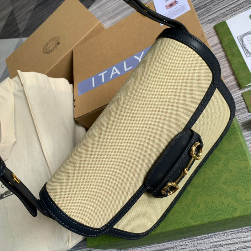 Front view of sleek modern women's handbag – women's statement bag