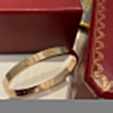 Lifestyle view of Cartier unisex jewelry piece