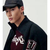 Close-up detail shot of Louis Vuitton luxury clothing with contemporary cut