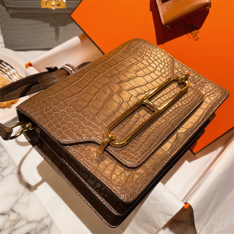  Clean-Lined top-handle bag carried on shoulder 10