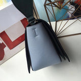 Close-up detail of classic signature women's handbag – women's luxury handbag
