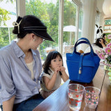 Side view of smart structured handbag