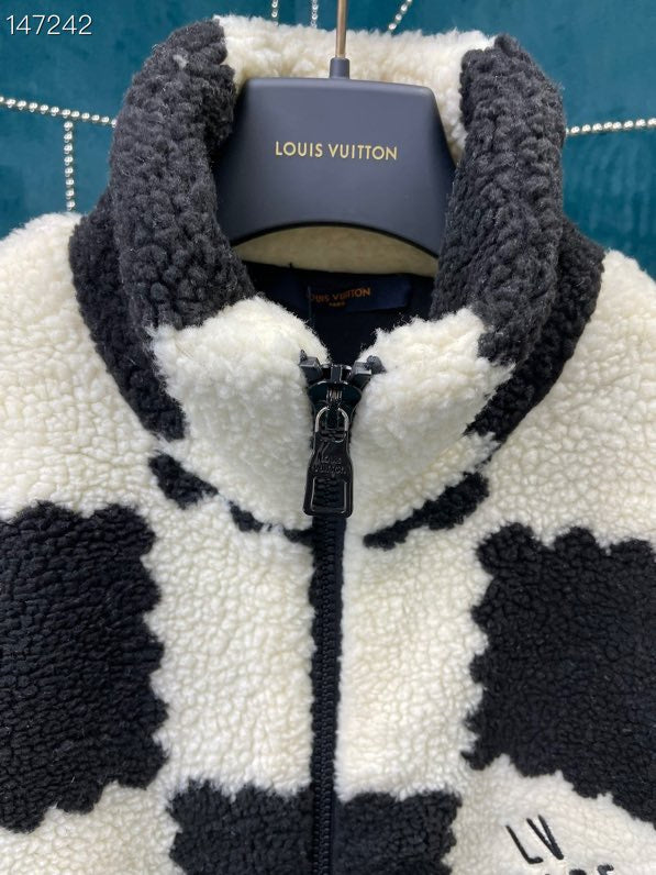 Full styled look of Louis Vuitton luxury clothing with signature branding