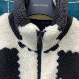Full styled look of Louis Vuitton luxury clothing with signature branding