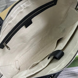 Back view of classic structured women's handbag – women's designer-style accessory
