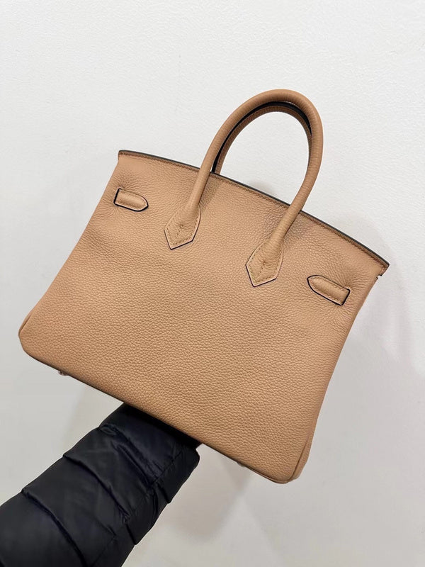 Side view of modern structured handbag