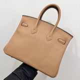 Side view of modern structured handbag