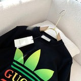 Front view of Gucci luxury clothing with logo-detail design