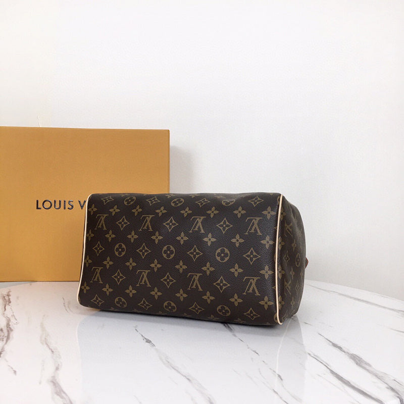 Styled lifestyle shot of signature polished women's handbag – women's luxury handbag