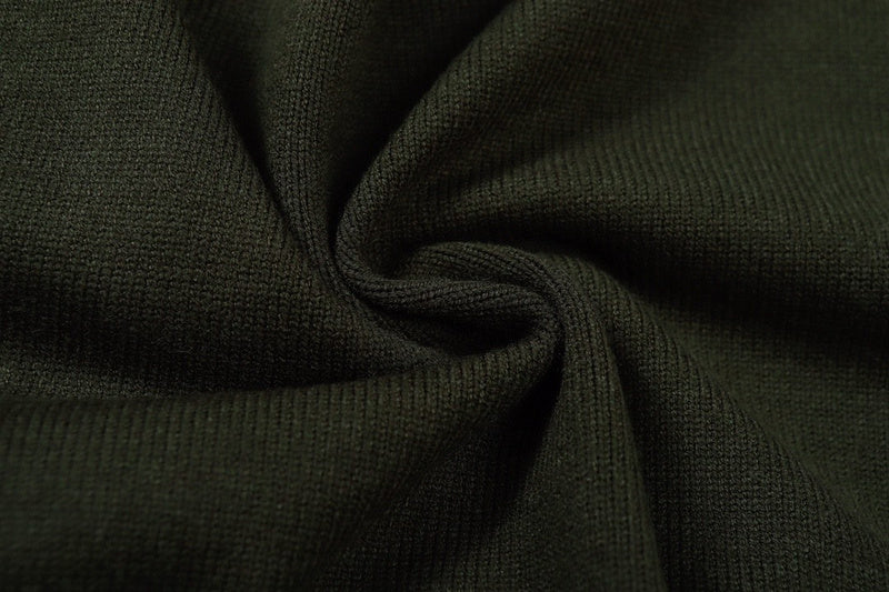 Close-up detail shot of Louis Vuitton luxury clothing with label-forward styling