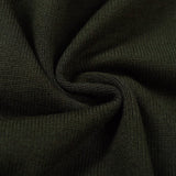 Close-up detail shot of Louis Vuitton luxury clothing with label-forward styling