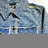 Close-up detail shot of Louis Vuitton luxury clothing with signature branding
