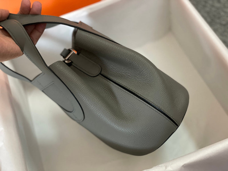 Side view of clean-lined structured handbag