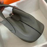 Side view of clean-lined structured handbag