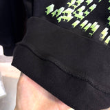 Close-up detail shot of Louis Vuitton luxury clothing with everyday silhouette