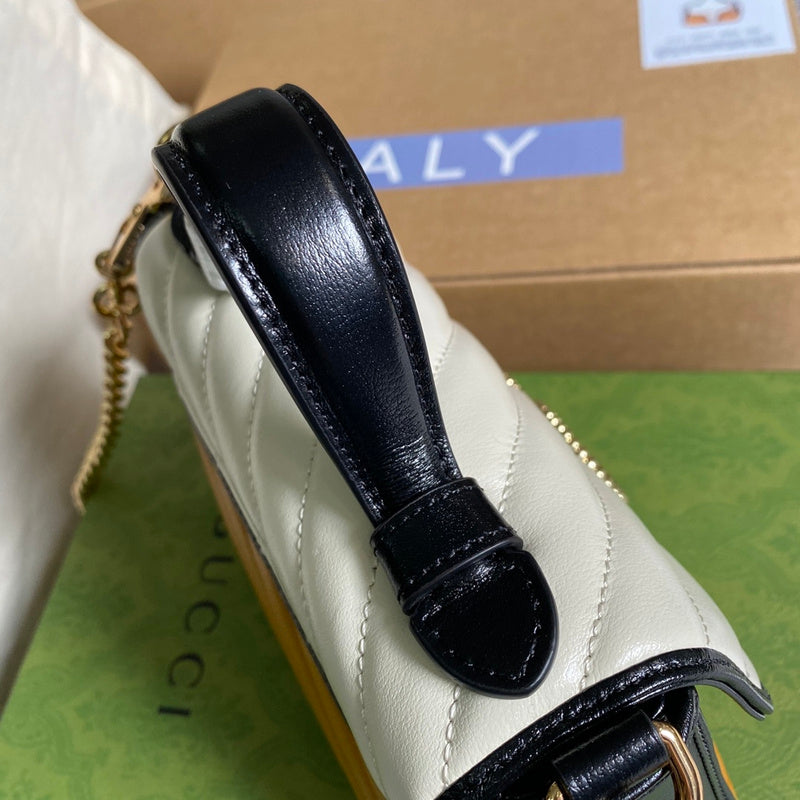 Styled lifestyle shot of polished classic women's handbag – women's statement bag