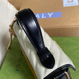 Styled lifestyle shot of polished classic women's handbag – women's statement bag