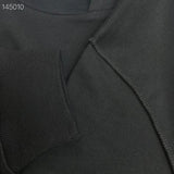 Flat lay presentation of Louis Vuitton luxury clothing with contemporary cut