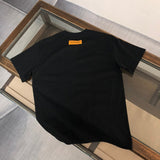 Close-up detail shot of Louis Vuitton cotton t-shirt with streetwear-inspired cut