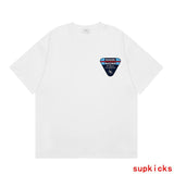 Front view of Rhude luxury clothing with signature branding