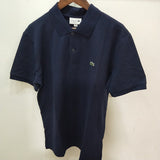 Close-up detail shot of Lacoste luxury clothing with monogram-inspired silhouette