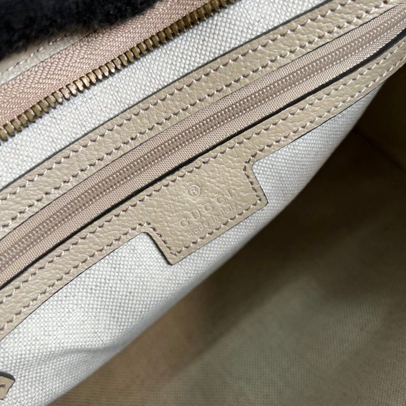 Side profile of modern classic women's handbag – women's luxury handbag