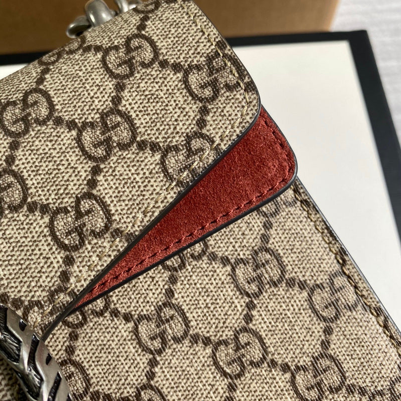 Back view of signature polished women's handbag – women's statement bag