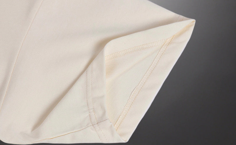 Side profile of Gucci luxury clothing with signature branding