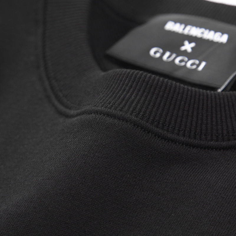Close-up detail shot of Gucci luxury clothing with signature branding