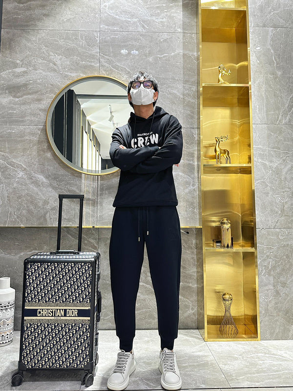 Flat lay presentation of Louis Vuitton luxury clothing with everyday silhouette