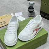 Side profile of Gucci neutral cream sneakers signature lace-up style
