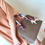 Side view of tailored structured handbag