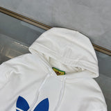Side profile of Gucci luxury clothing with logo-detail design