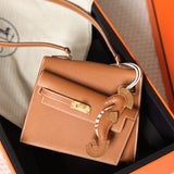 Side view of sculpted structured handbag