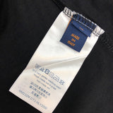 Flat lay presentation of Louis Vuitton cotton t-shirt with monogram-inspired silhouette