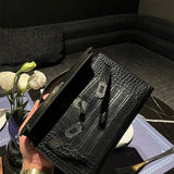 Side view of versatile structured handbag