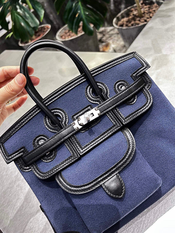 Side view of classic structured handbag