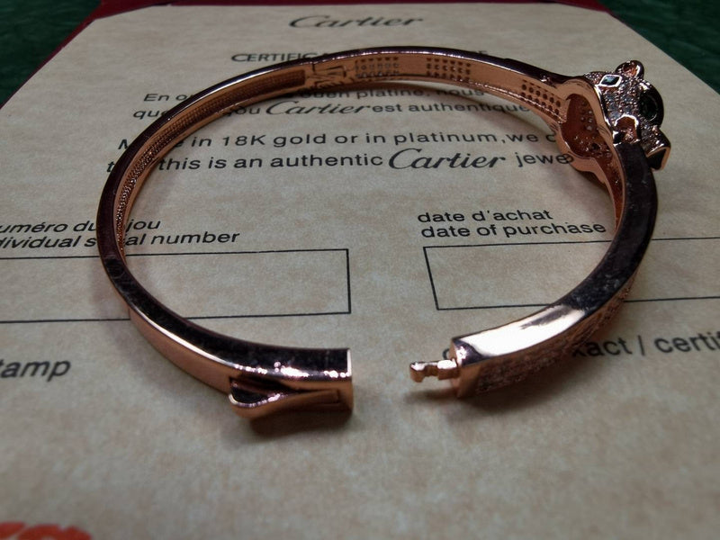 Angled view of Cartier unisex jewelry piece
