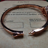 Angled view of Cartier unisex jewelry piece