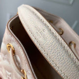 Styled lifestyle shot of premium polished women's handbag – women's designer-style accessory