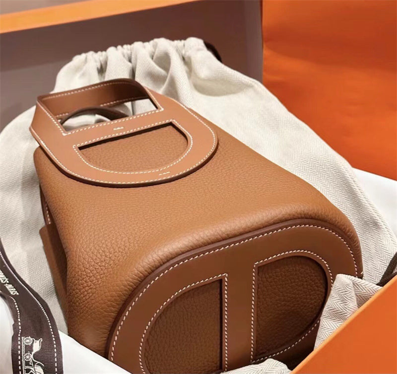 Side view of poised structured handbag