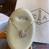 Lifestyle view of Van Cleef & Arpels unisex jewelry piece