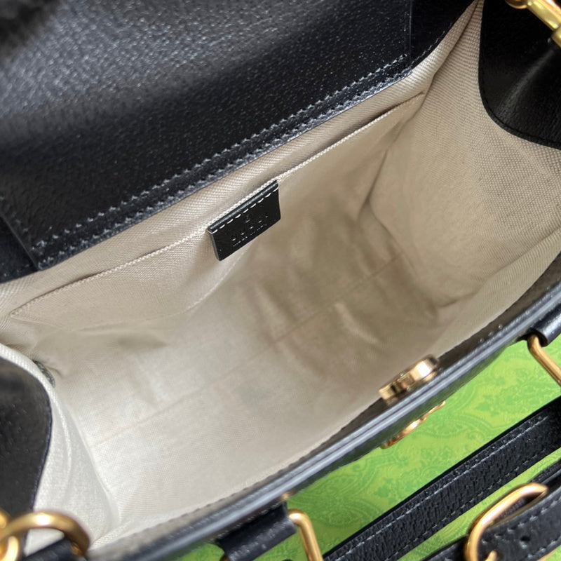 Close-up detail of signature elevated women's handbag – women's designer-style accessory