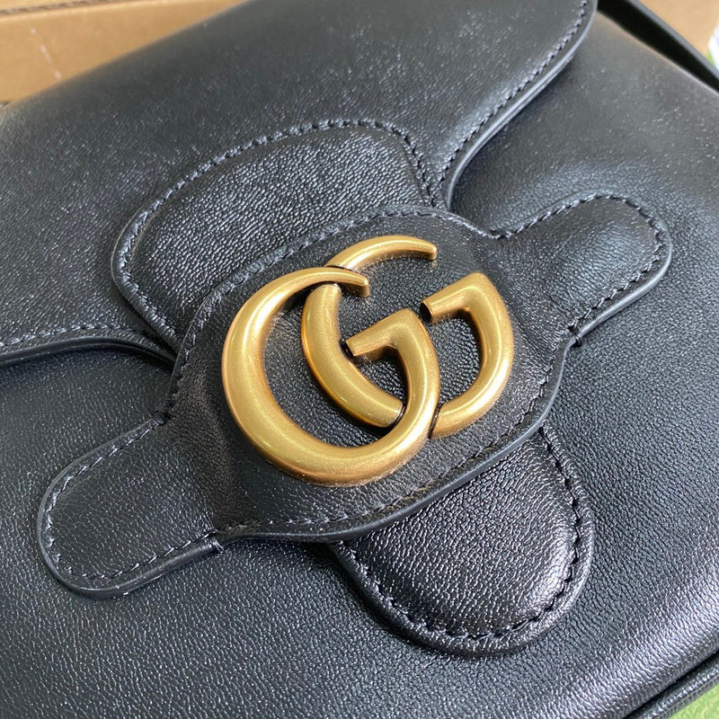 Styled lifestyle shot of everyday-luxe refined women's handbag – women's luxury accessory
