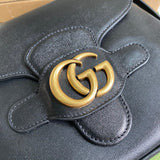 Styled lifestyle shot of everyday-luxe refined women's handbag – women's luxury accessory