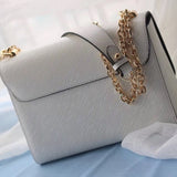 Top view of refined modern women's handbag – women's luxury accessory